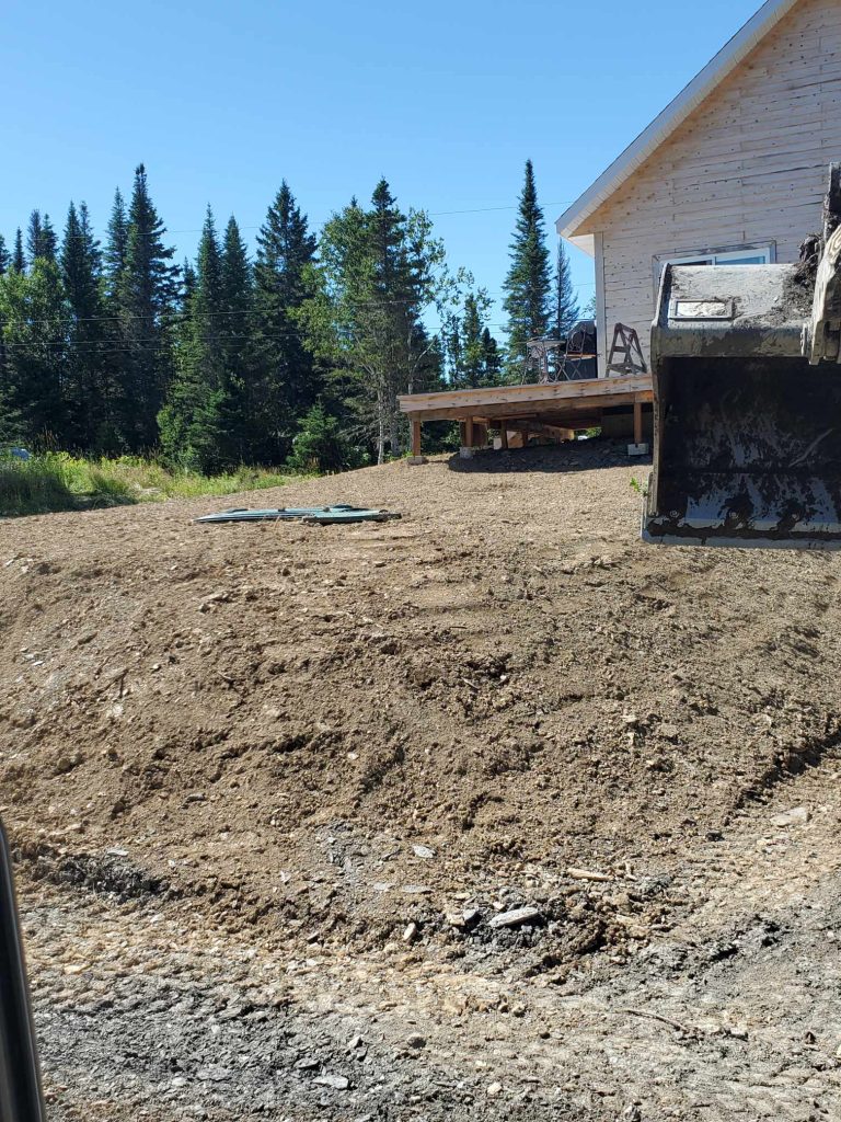 déneigement excavation transport bois chauffage Matane St-René débroussages travaux terrassement sable terre gravier pierre net pelle mécanique location chemin forestier tracteur